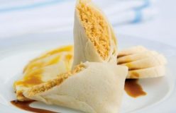 Coconut and palm sugar pancake rolls with banana and pineapple